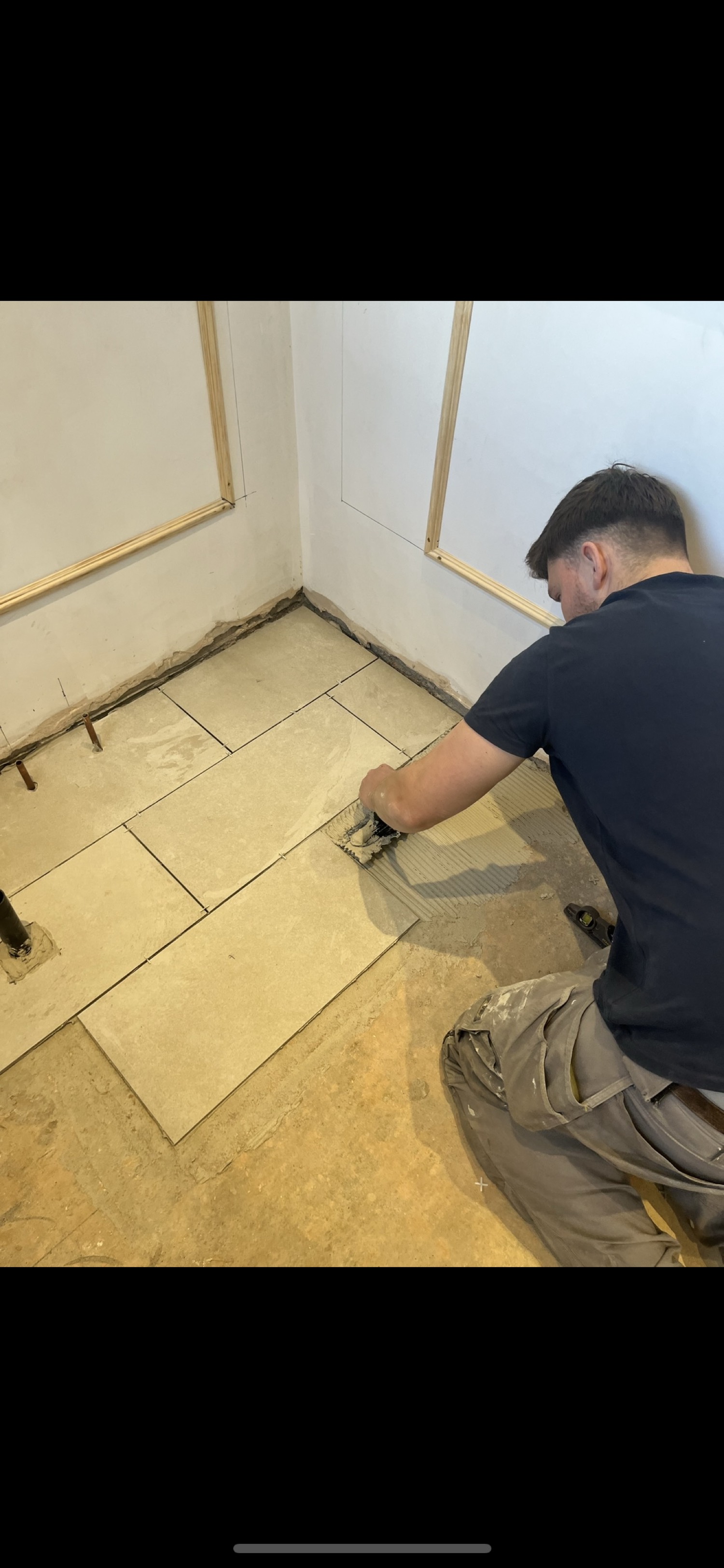 Lewis tiling a floor